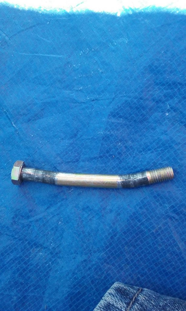 bent AN5 bolt from hang glider downtube apex